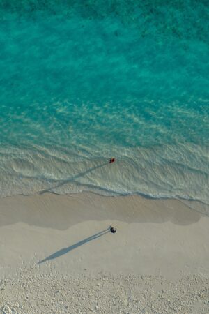Crystal clear Maldivian waters, shot from above.